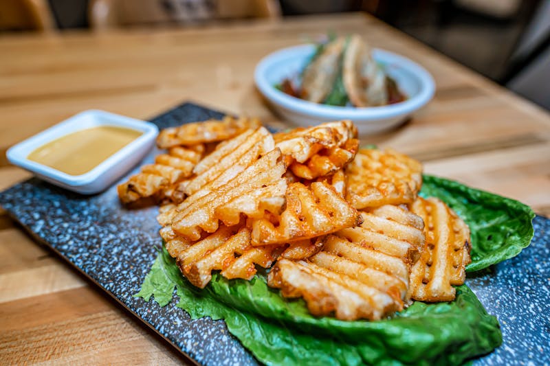 Loaded waffle fries with toppings