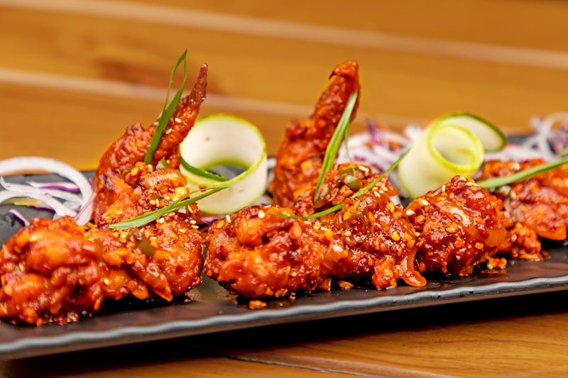 Lemon Pepper wings with zesty citrus and cracked pepper